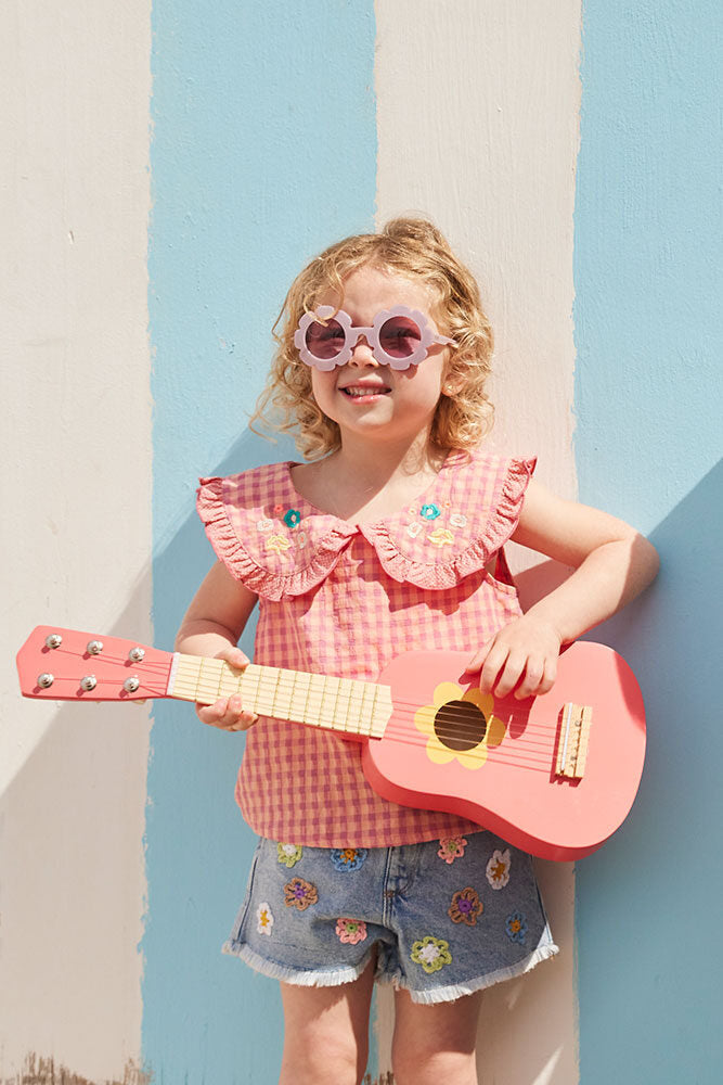 Toy guitar flower pink