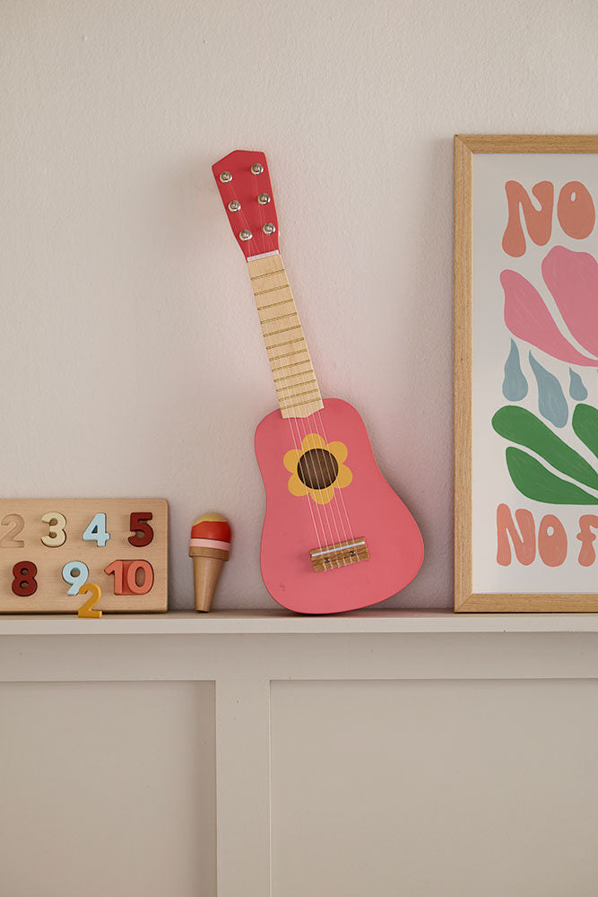 Toy guitar flower pink