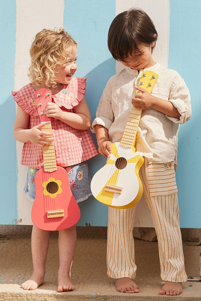Toy guitar flower pink