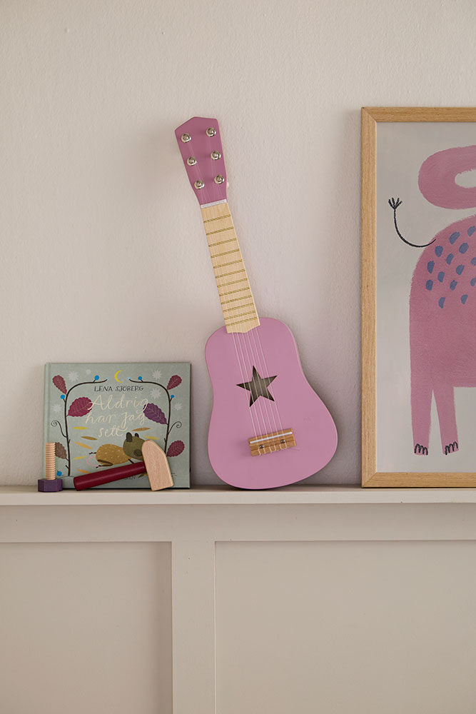 Toy guitar dark pink